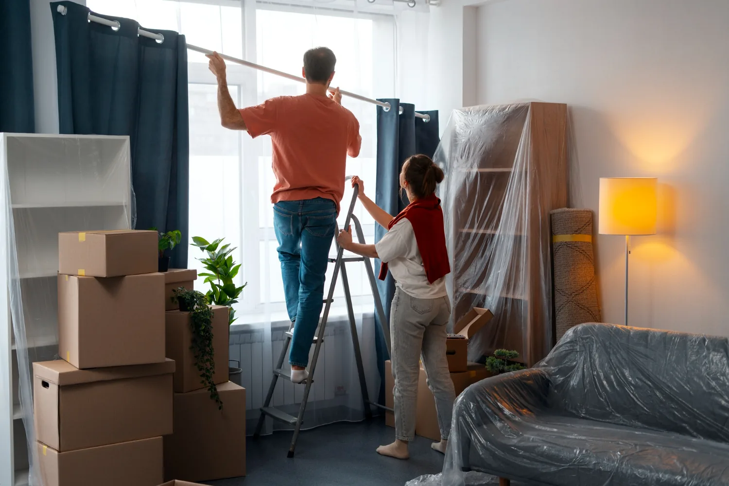 A couple preparing their home for a move